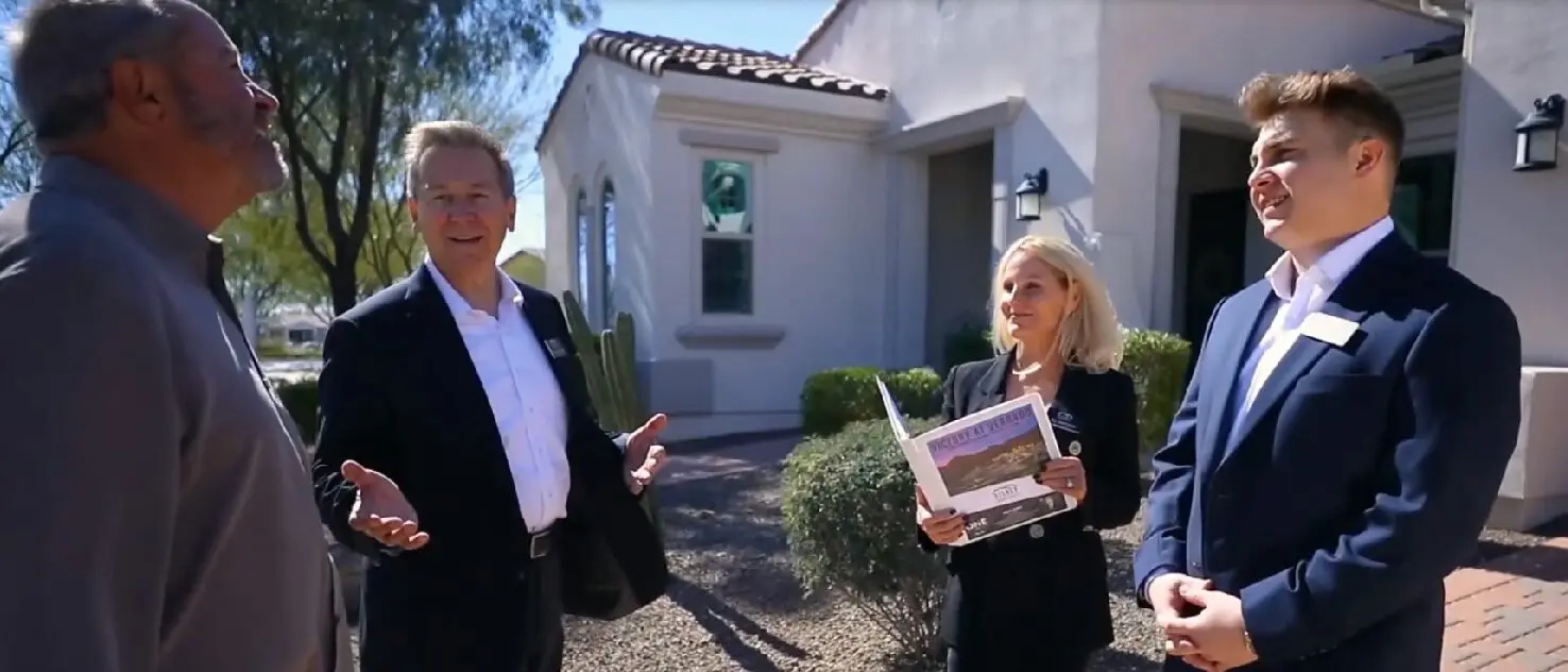 Disney Premier Properties Team in Front of a House